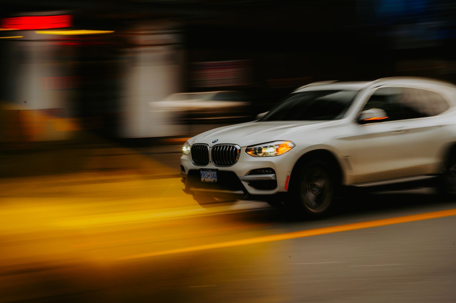 SUV driving through a Dallas city street