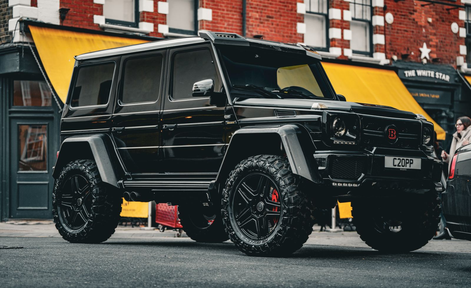 Black SUV paint with deep, swirl-free gloss after correction