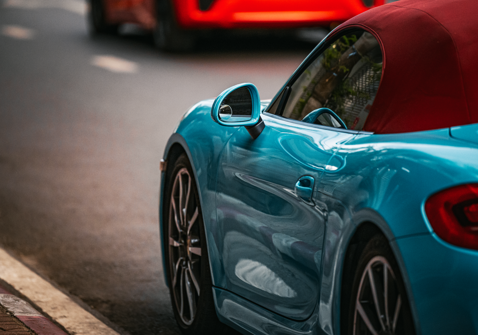 Blue sports car with deep gloss after coating