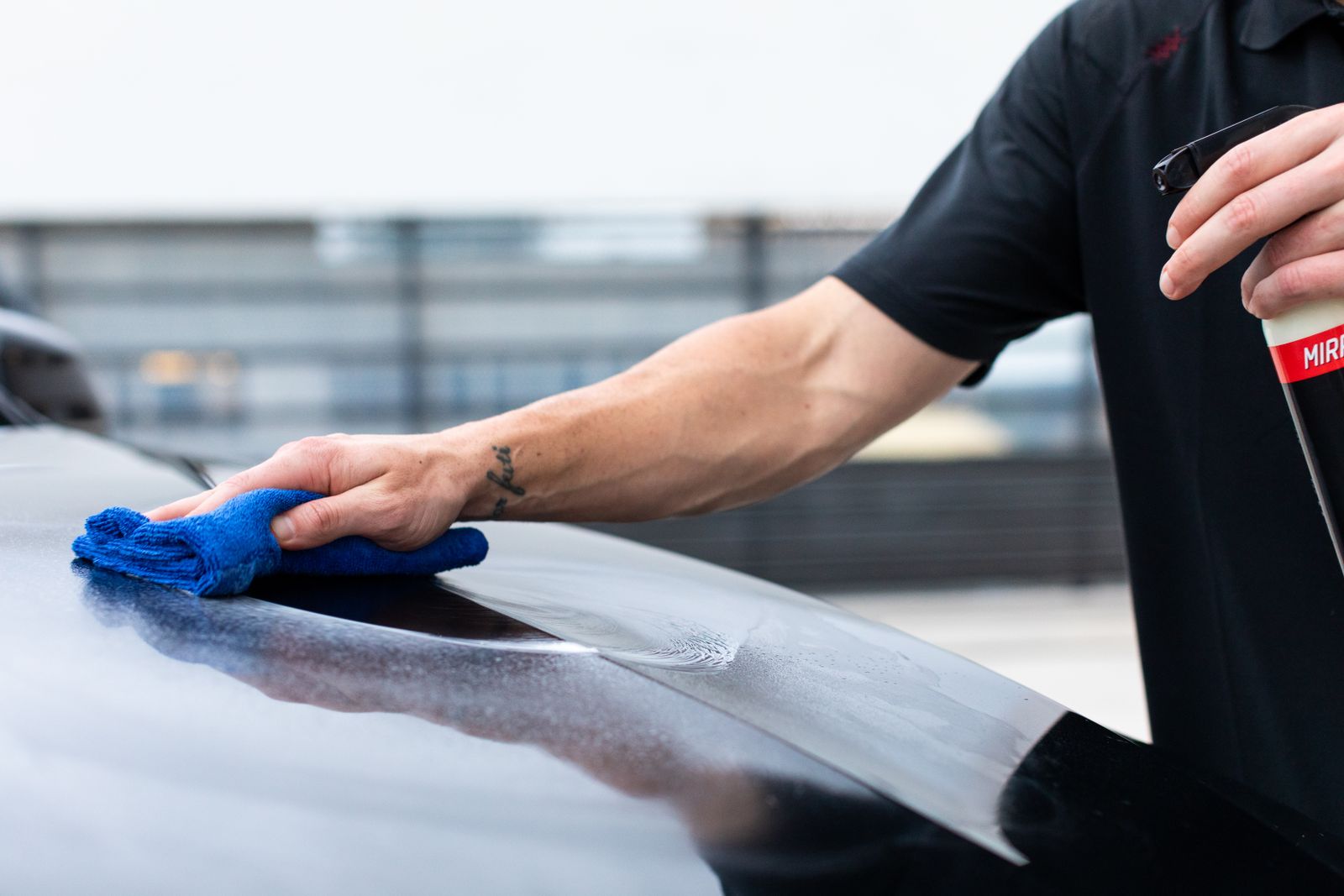 Hand inspecting and wiping a painted panel
