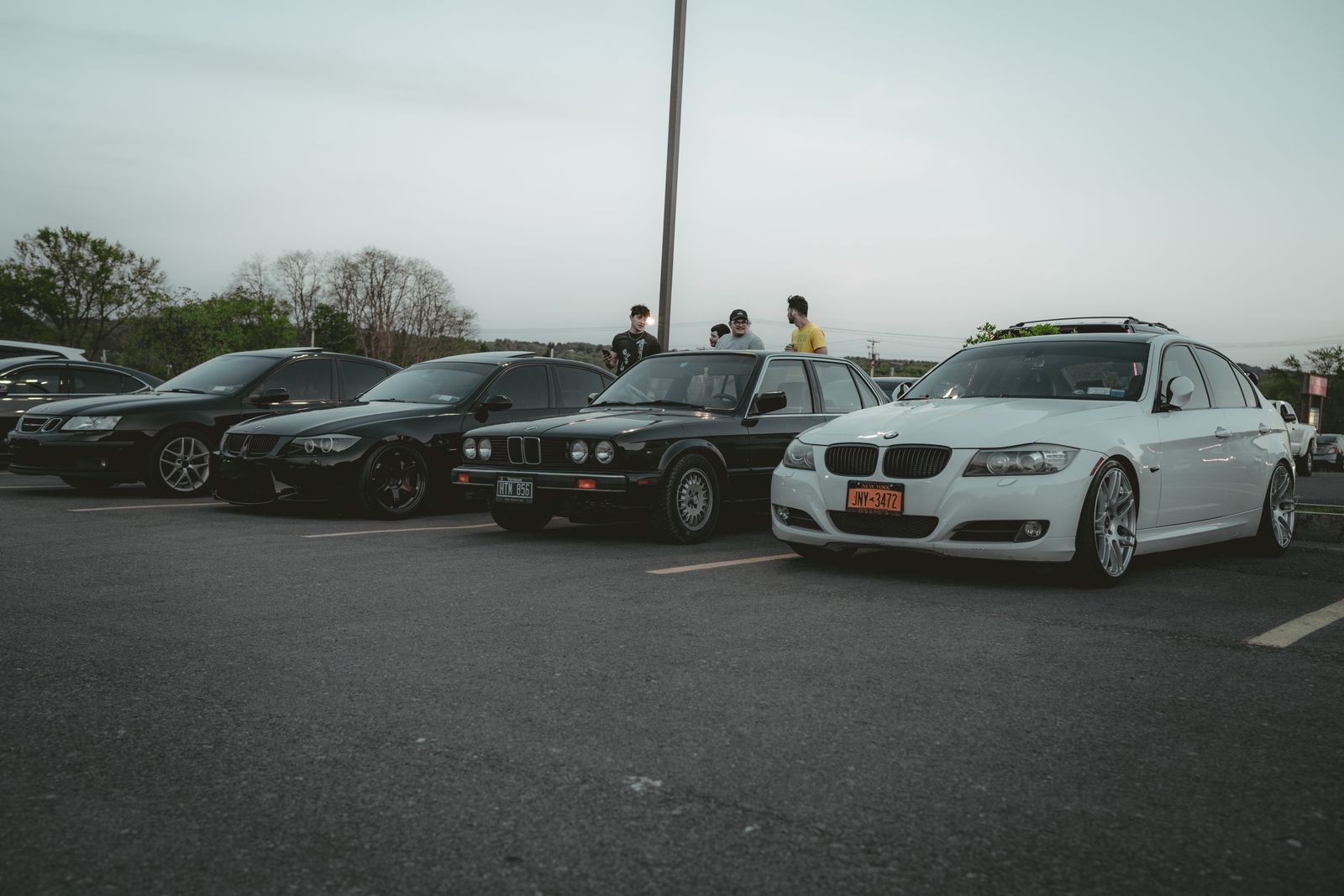 Row of fleet vehicles lined up for on-site detailing